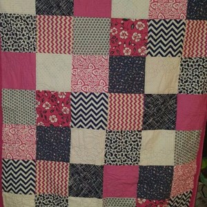 Pink and navy quilt