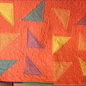 Baby quilt falling Triangles