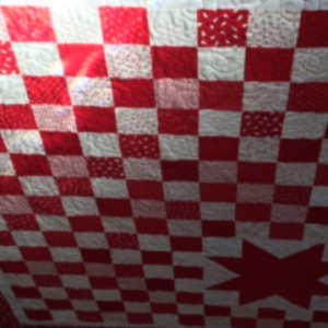 Big Red Star Christmas Quilt and table runner.