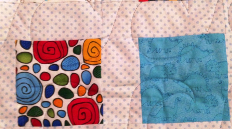 Ren's baby quilt - sashed charms