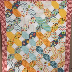 X and O. I spy quilt for adopted Hatian Children