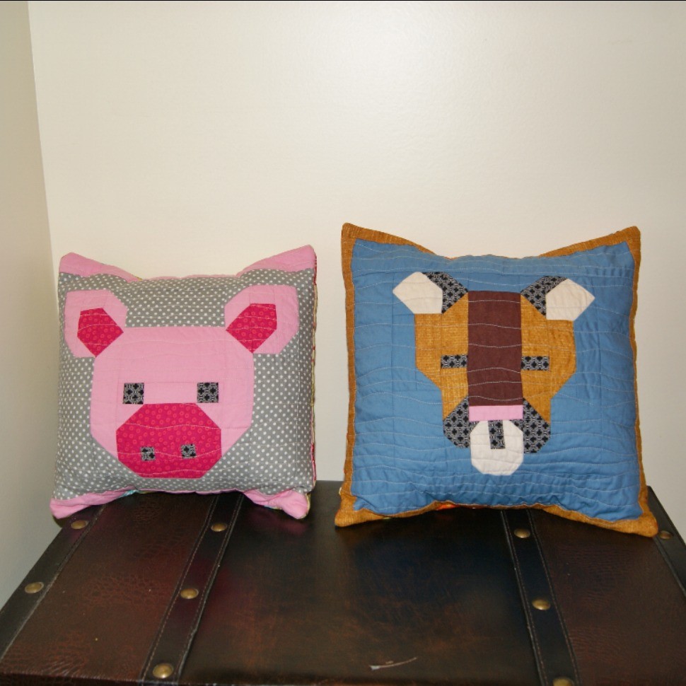 Pig and Cougar pillows
