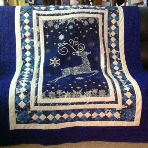 Blue Northcott reindeer quilt
