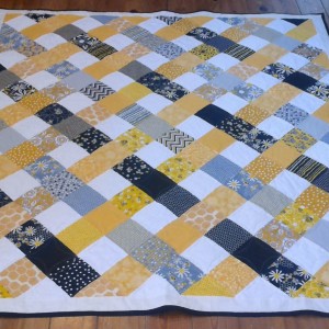 Black and gold weave quilt