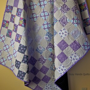 Cuzco 16-Patch Lap Quilt in Purples