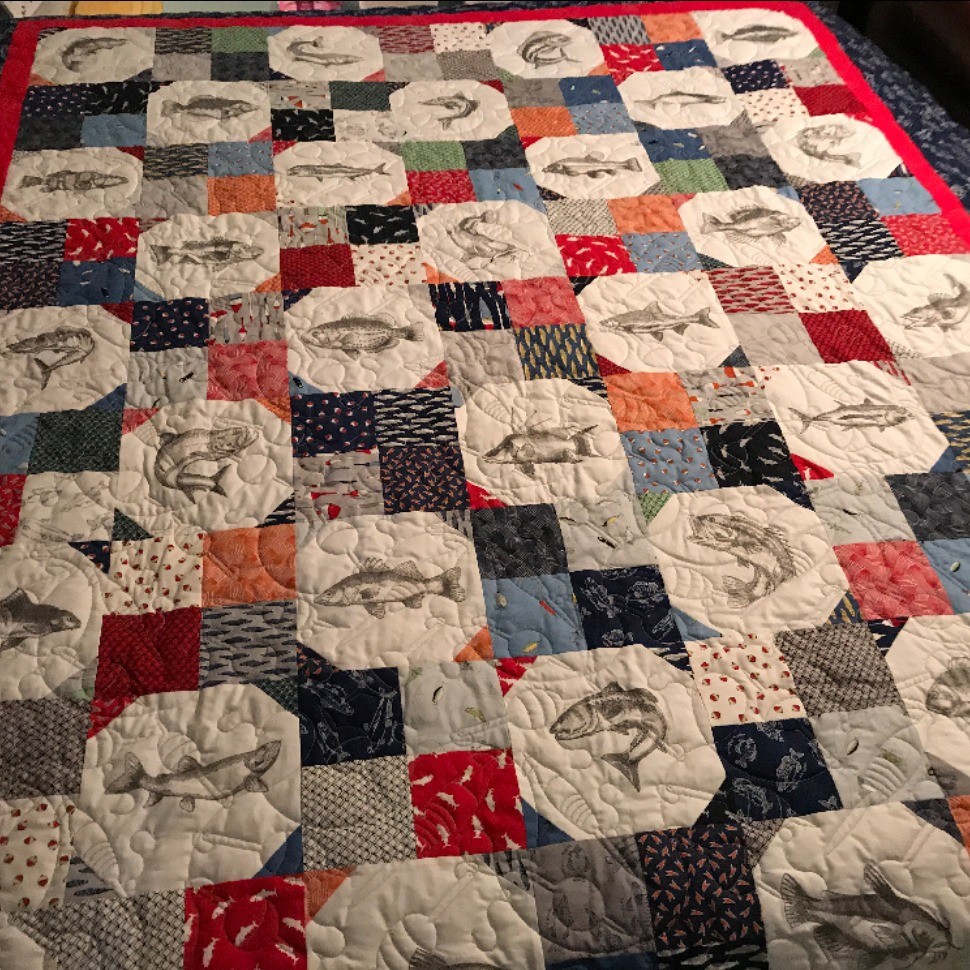 Fishy snowball and 4 patch quilt