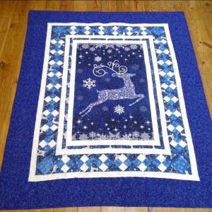 Blue Northcott Reindeer Sparkle pattern quilt