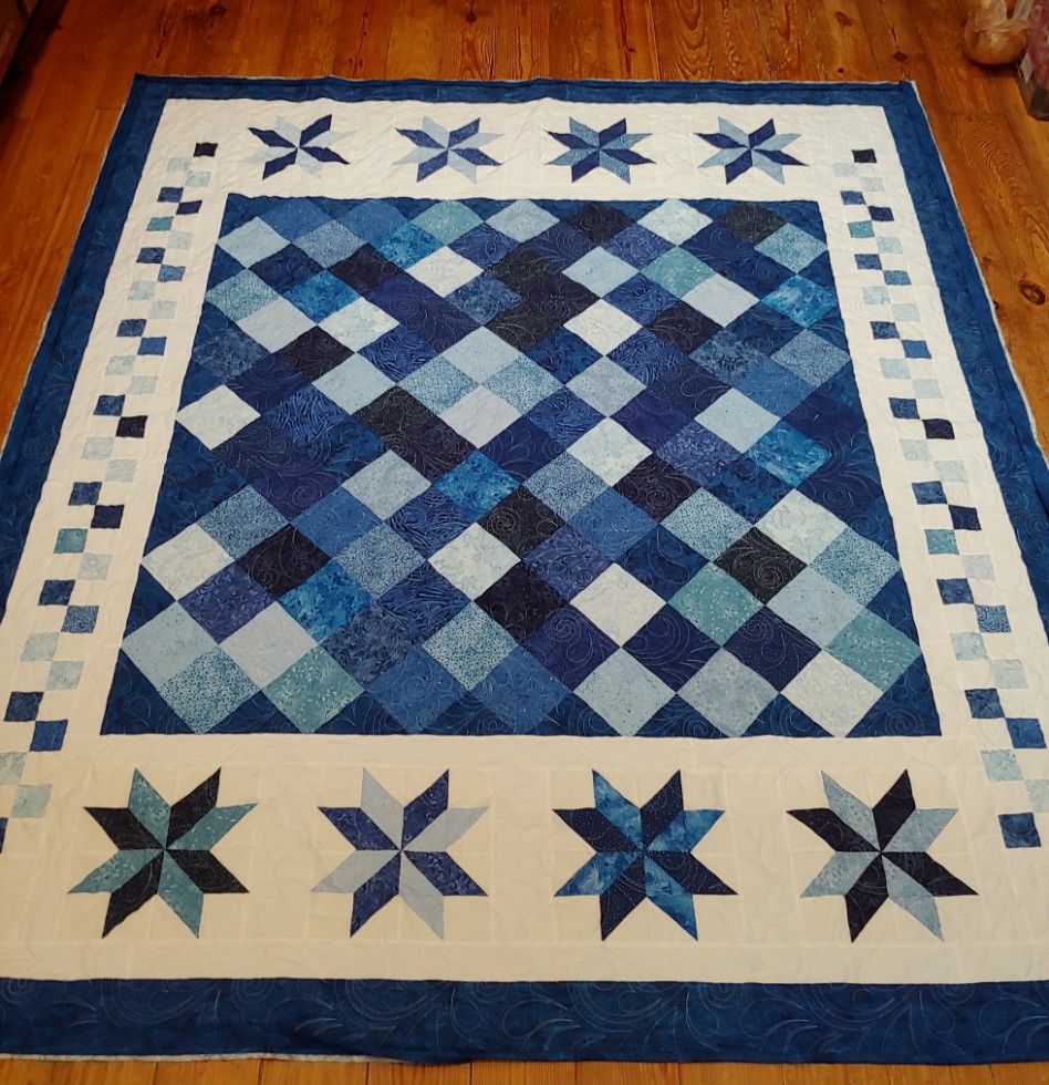 Blue quilt for neighbor's son