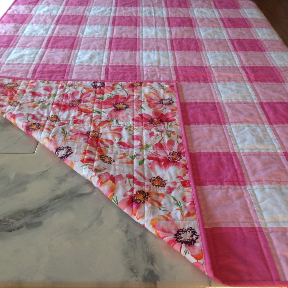 Pink Gingham Quilt with Floral Backing