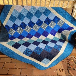 Diagonal blue squares baby quilt