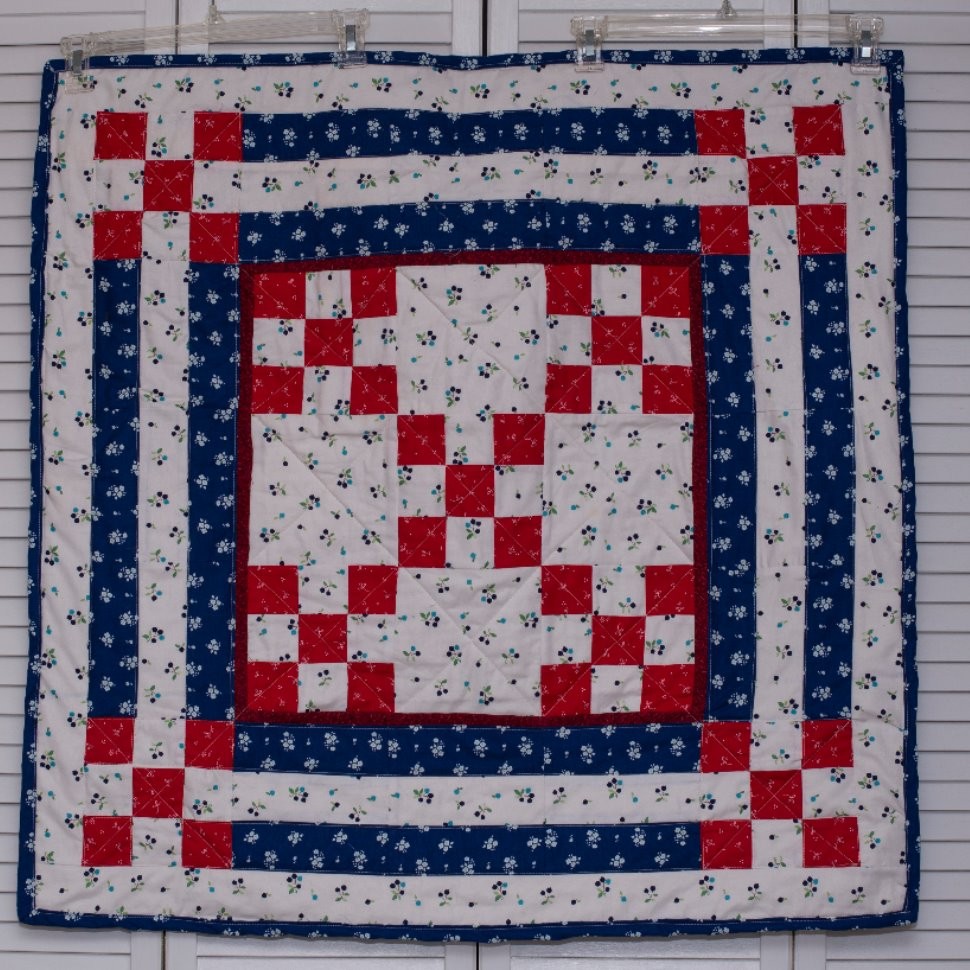 Red, white and blue wall hanging