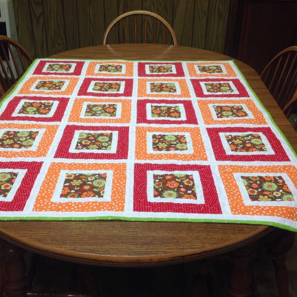 Square in a square lap quilt
