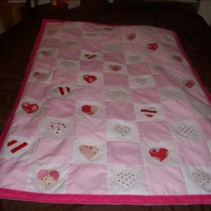 Pretty pink applique quilt
