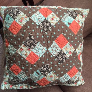 Blue and brown patchwork pillow