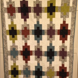 Masculine quilt with pieced back