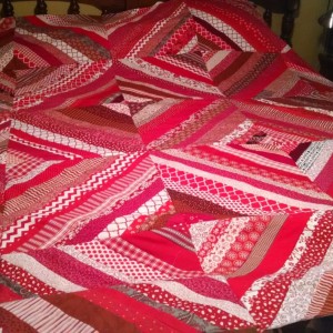 Red and White Strip Quilt