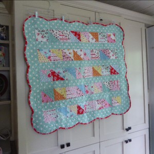Half square triangle baby quilt